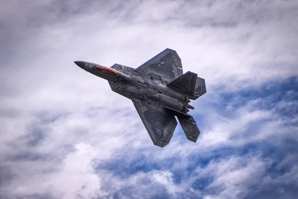 jet-aircraft-flying-through-cloudy-blue-skies